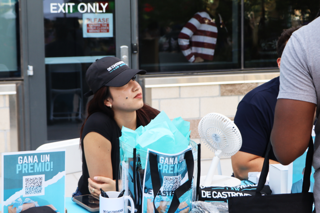 De Castroverde Injury Law team members speak to the community at the event.